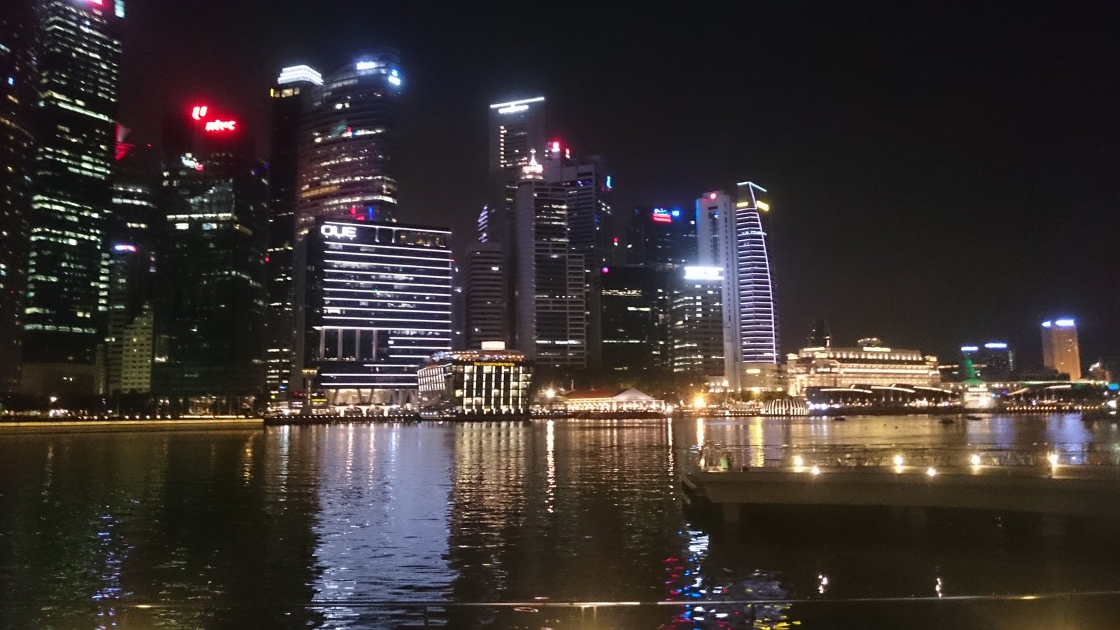 Illuminated Singapore skyline showing a well-lit area for night sightseeing