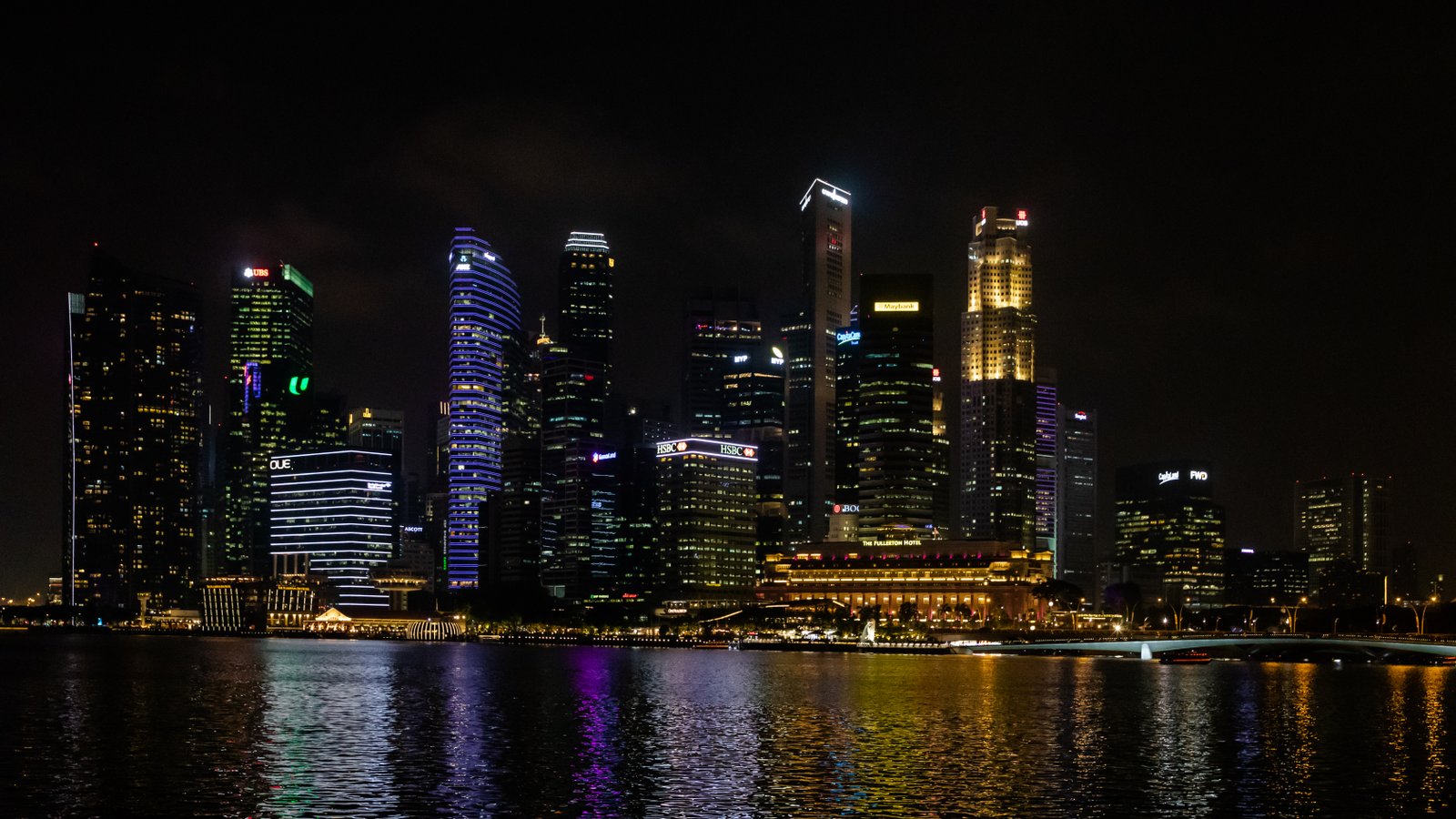 Night travel scene in Singapore showing an active evening destination