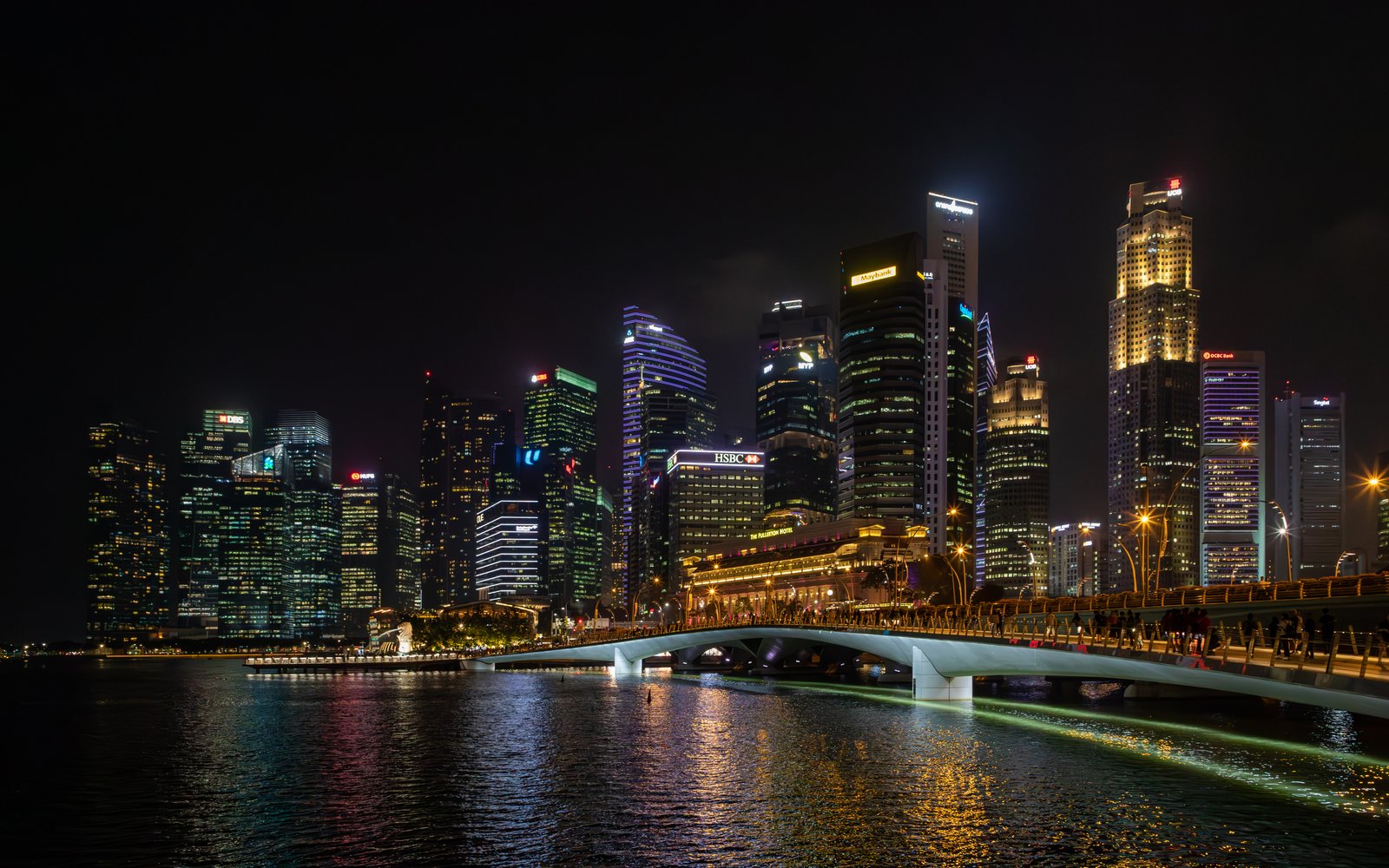 Singapore waterfront skyline illuminated at night for noctourism planning